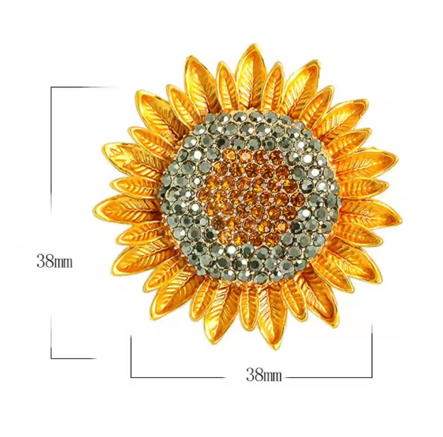 Spilla Sole lussuoso metallo tipo strass.